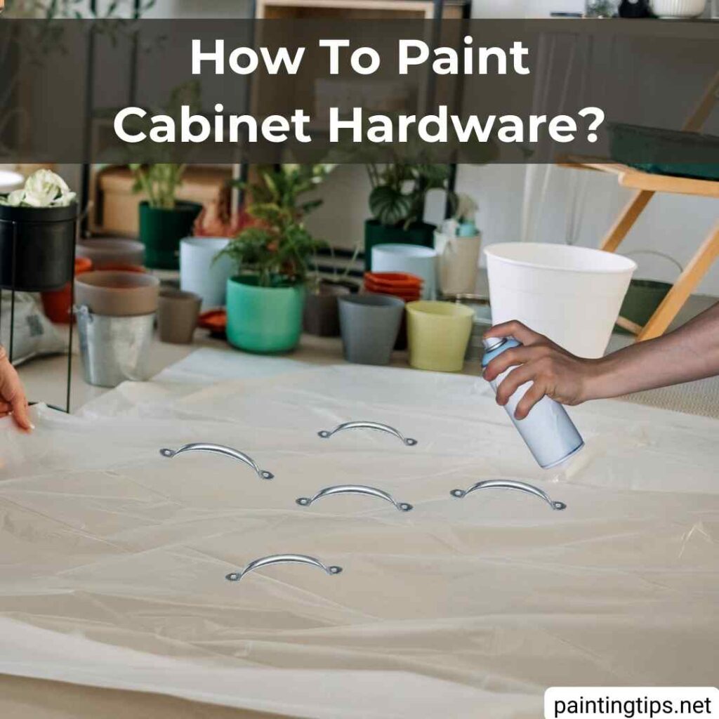 Painting cabinet hardware.