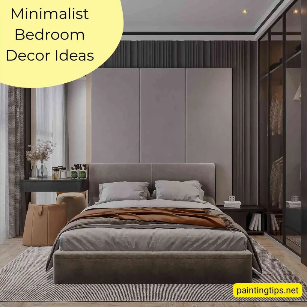 Minimalist bedroom with low light, dark walls and light wood flooring.