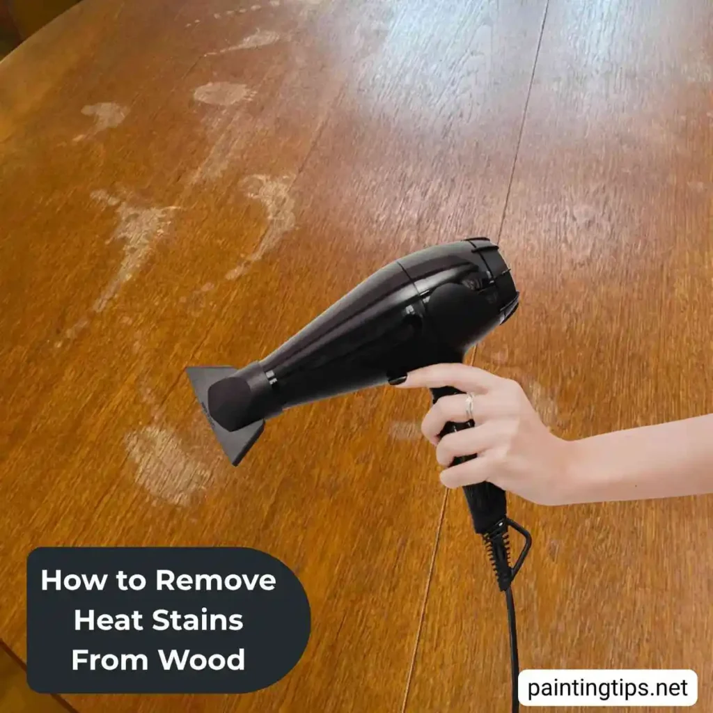 Removing heat marks from wood using a hair dryer.